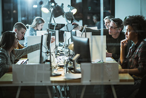 A woman presenting at a conference