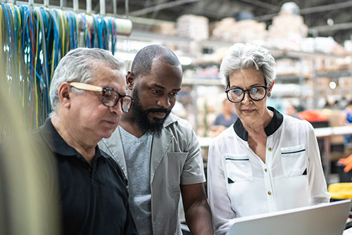 A woman presenting at a conference
