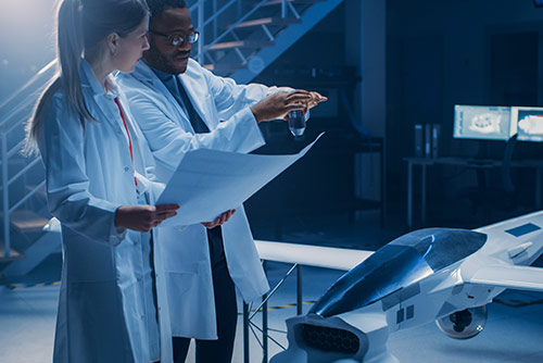 A woman presenting at a conference